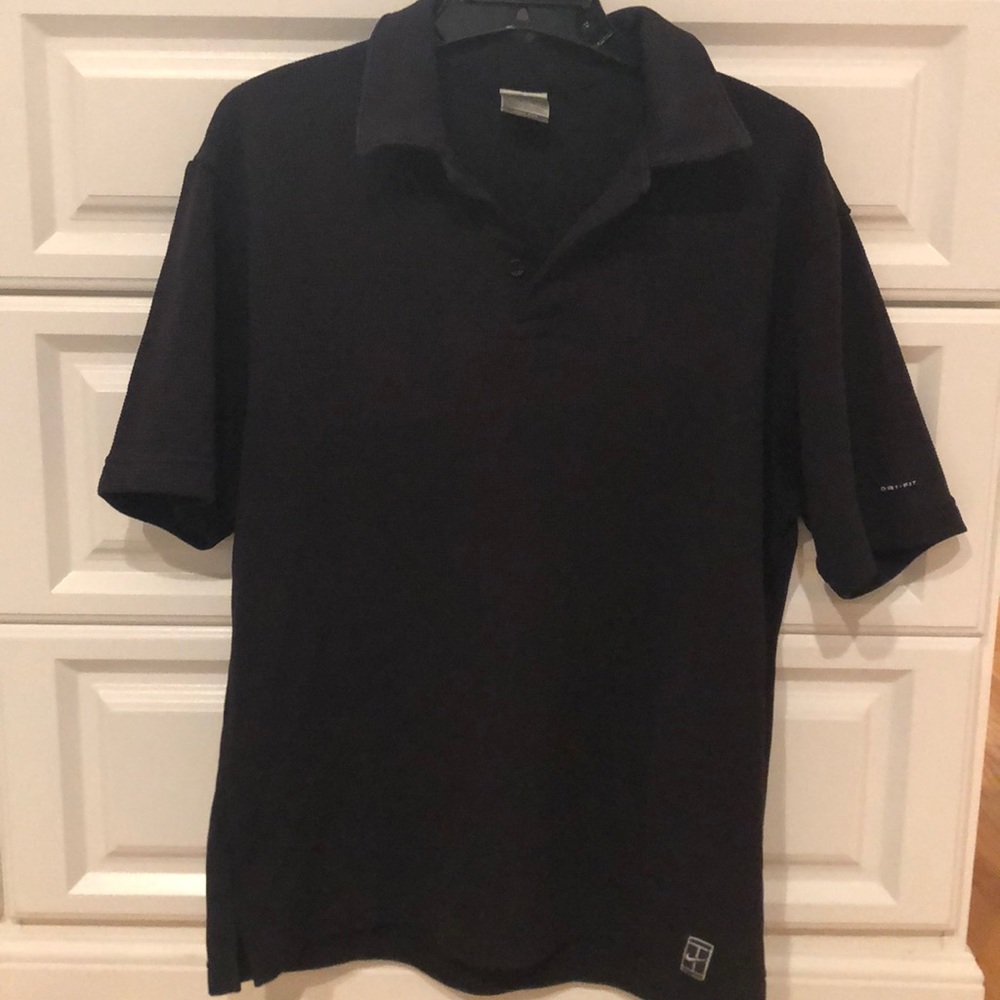 Nike.Black dri-fit. Collar,3 buttons,tennis  shirt.No stains, no wear/tear signs